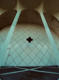 Directly below shot of tiled floor by wall