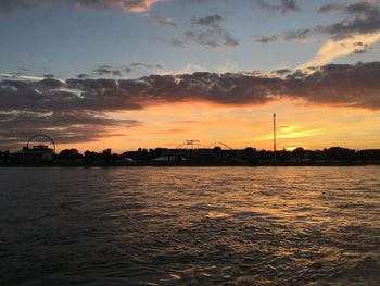 Scenic view of sea at sunset