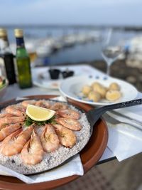 Close-up of shrimps in plate on table