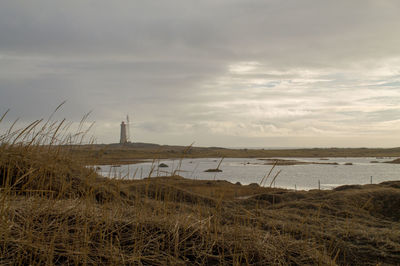 Scenic view of beach against sky