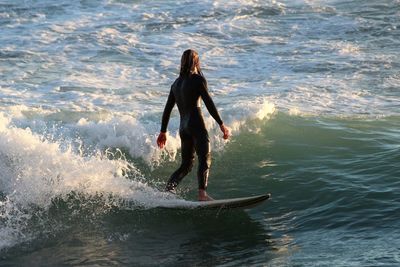 Man surfing in sea