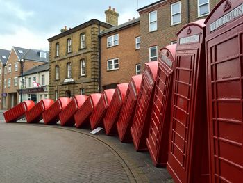 Row of red structure against sky