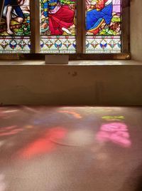 Multi colored glass window of building