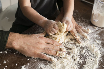 Midsection of chef preparing food