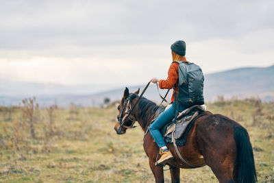 Man riding horse