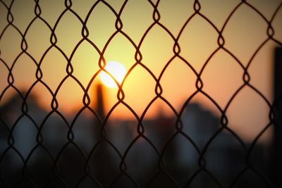 Chainlink fence seen through chainlink fence