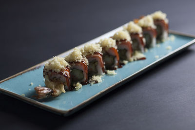 Close-up of serving food on table