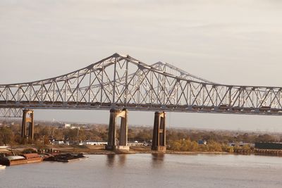 Bridge over river against sky