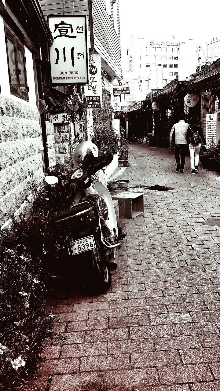 transportation, mode of transport, land vehicle, street, building exterior, car, built structure, architecture, city, men, road, bicycle, incidental people, travel, city life, day, the way forward, outdoors