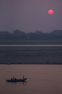 Scenic view of sea against sky during sunrise