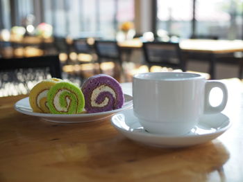 Close-up of coffee served on table