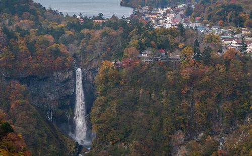 Houses by kegon falls during autumn