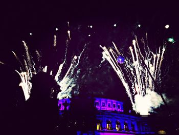 Firework display at night