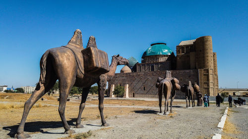 Panoramic view of a horse against the sky