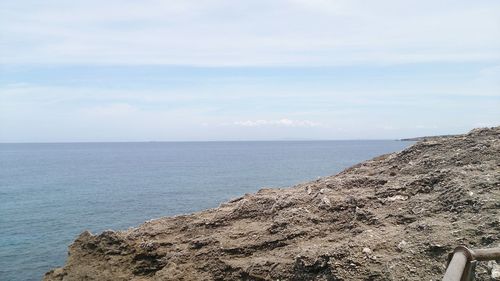 Scenic view of calm sea against sky