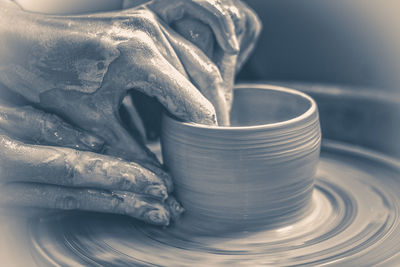 Close-up of human hand on table