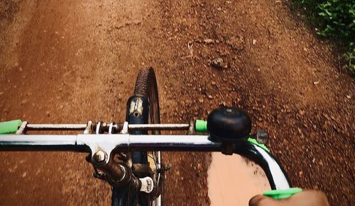 High angle view of bicycle riding on road