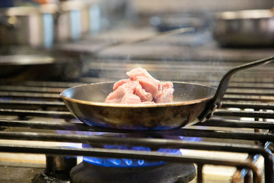 Close-up of meat on barbecue grill