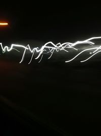 Light painting against black background