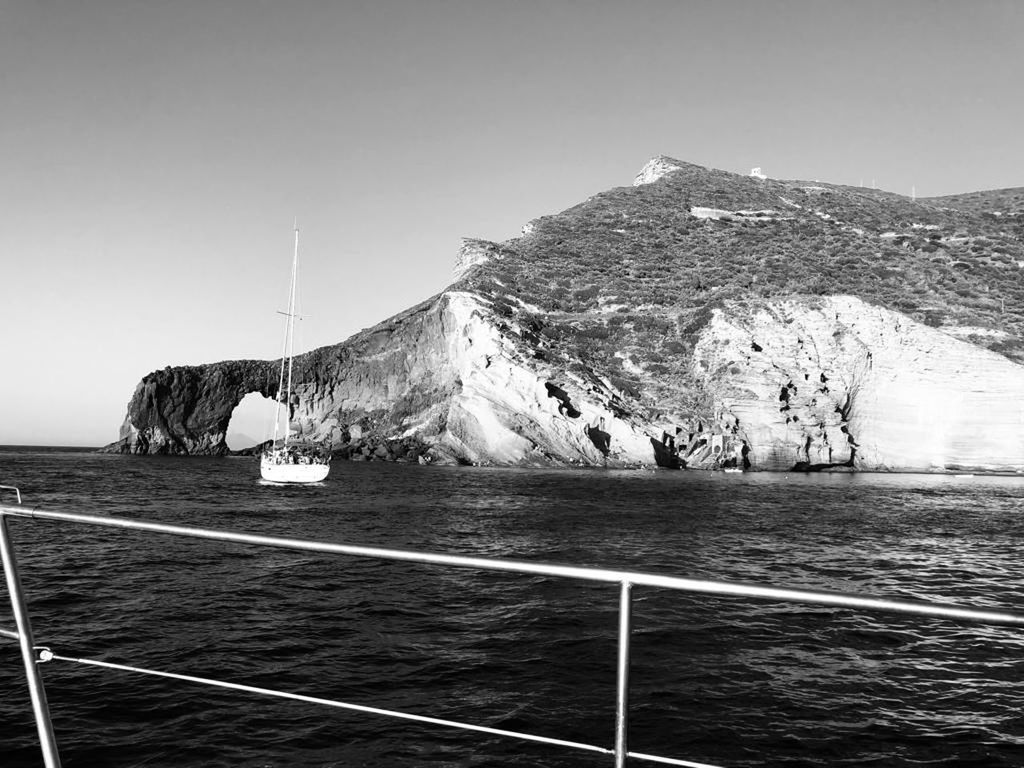 SAILBOAT ON SEA AGAINST CLEAR SKY