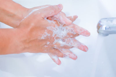 Cropped image of person hand with ice cream