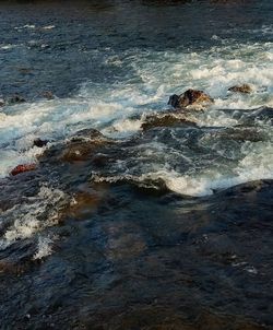 Waves splashing on rocks