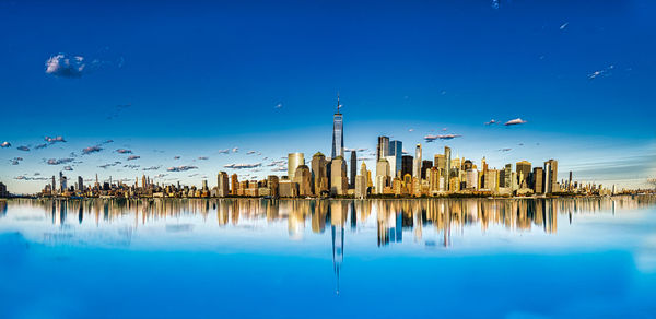 Reflection of boats in harbor