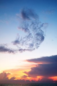 Low angle view of dramatic sky during sunset