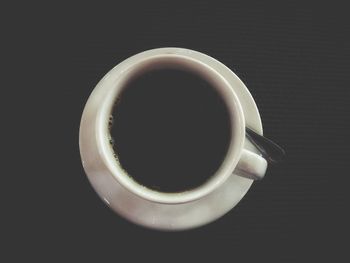 High angle view of coffee cup on table