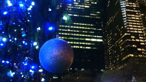 Low angle view of illuminated building at night