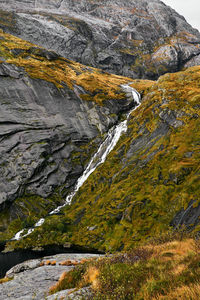 Scenic view of waterfall on the way to munkebu mountain in moskenesoya lofoten norway