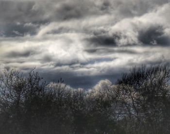 Scenic view of landscape against cloudy sky