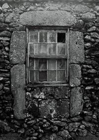 Low angle view of abandoned house