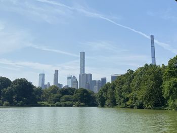 Buildings in city against sky