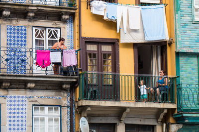 People in front of building