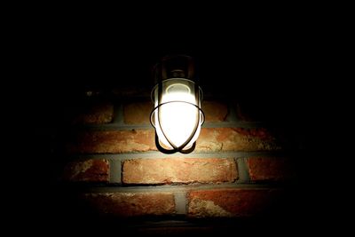 Low angle view of illuminated light bulb