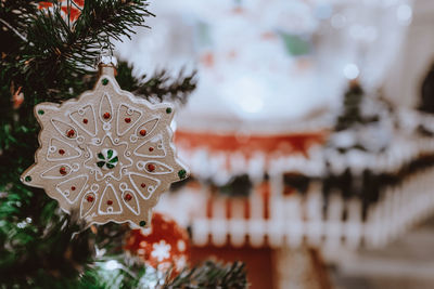Christmas toy golden christmas snowflake hanging on the christmas tree