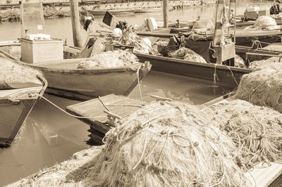 Boats moored on shore