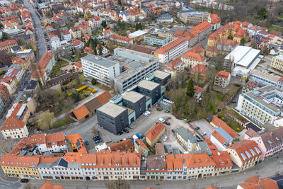 High angle view of street and buildings in town