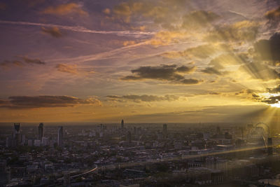 Cityscape against sky during sunset