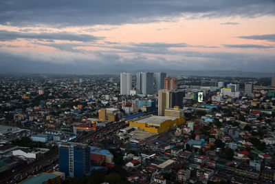 High angle view of buildings against sky during sunset