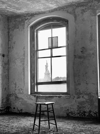 View of woman standing by window