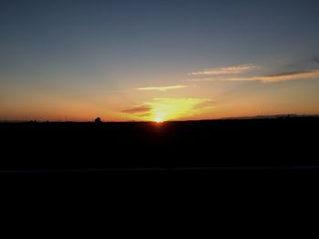 Scenic view of sunset over landscape