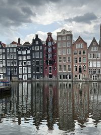 Buildings in city against sky