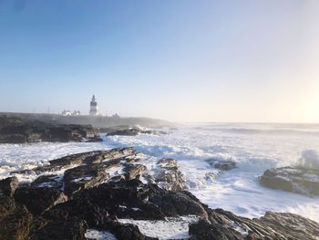 Scenic view of sea against clear sky