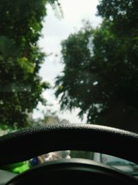 Close-up of car seen through windshield