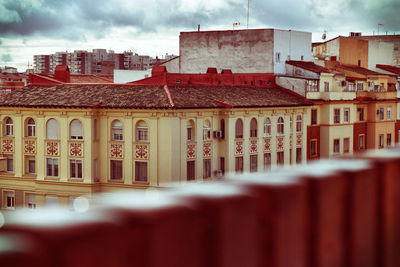 Buildings in city against sky