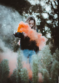 Young woman in forest