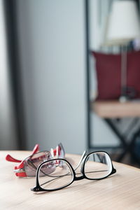 Close-up of eyeglasses on table