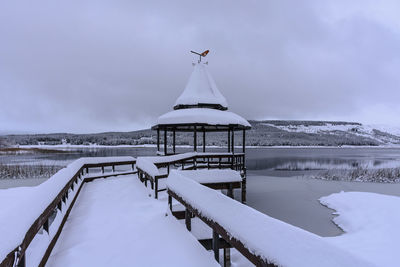 Scenic view of frozen lake against sky